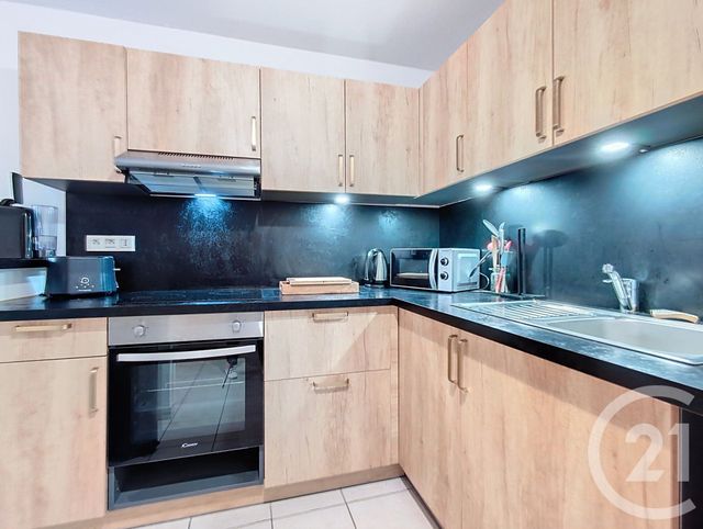 Afficher la photo en grand Appartement T3 à vendre - 3 pièces - 56.51 m2 - ARCACHON - 33 - AQUITAINE - Century 21 Duprat & Associés